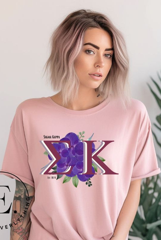 Looking for a way to showcase your Sigma Kappa pride? Look no further than our stylish t-shirt, featuring the sorority's iconic letters and the enchanting wild purple violets on a pink shirt. 