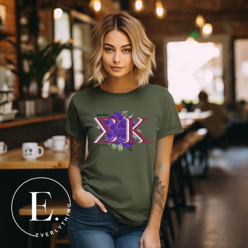 Elevate your Sigma Kappa sisterhood with our premium sublimation t-shirt download. Featuring the sorority's letters and the enchanting wild purple violets on an olive shirt. 