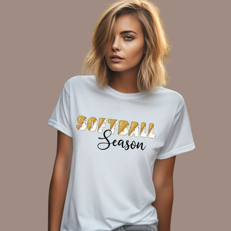 Softball season PNG sublimation digital download design, on a white graphic tee.