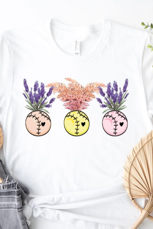 Softball flower vases holding flowers on a white graphic tee.