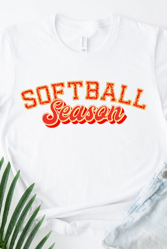 Softball season sports lettering white graphic tee.