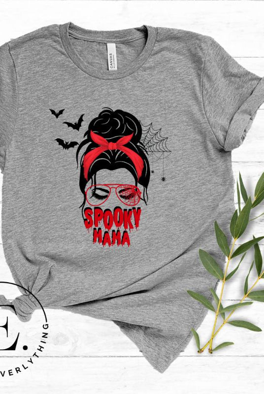 "Spooky Mama" messy bun Halloween T-shirt on grey colored t-shirt.