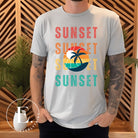 Capture the essence of tropical paradise with our Sunset t-shirt. Featuring four rows of the word 'sunset' surrounding a stunning palm tree on a grey shirt. 