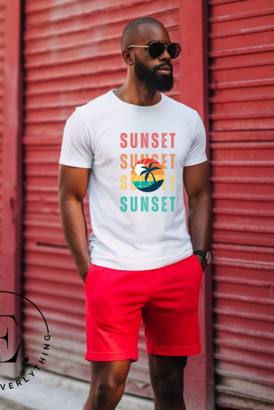 Capture the essence of tropical paradise with our Sunset t-shirt. This shirt features four rows of the word 'sunset' surrounding a stunning palm tree, bringing a laid-back, beachy vibe to your wardrobe with this white shirt. 