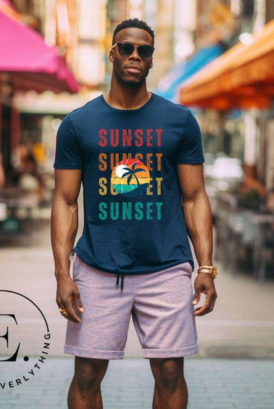 Capture the essence of tropical paradise with our Sunset t-shirt. Featuring four rows of the word 'sunset' surrounding a stunning palm tree on a navy shirt. 