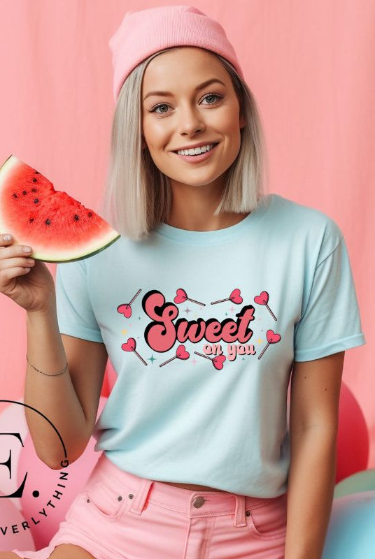 Spread the love with our charming Valentine's Day shirt featuring the endearing phrase " Sweet on You" surrounded by heart lollipops on a blue shirt. 