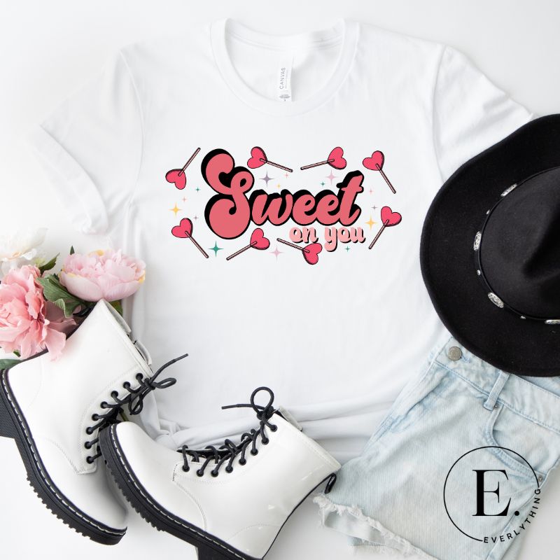 Spread sweetness this Valentine's Day with our PNG sublimation digital download! Create an adorable shirt adorned with heart lollipops and the charming saying "Sweet On You." Example of Sweet On You PNG sublimation digital download on a white shirt. 