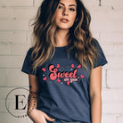 Spread sweetness this Valentine's Day with our PNG sublimation digital download! Create an adorable shirt adorned with heart lollipops and the charming saying "Sweet On You." Example of Sweet On You PNG sublimation digital download on a navy shirt. 