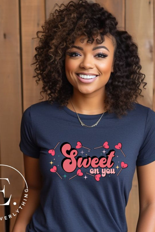 Spread the love with our charming Valentine's Day shirt featuring the endearing phrase " Sweet on You" surrounded by heart lollipops on a navy shirt. 