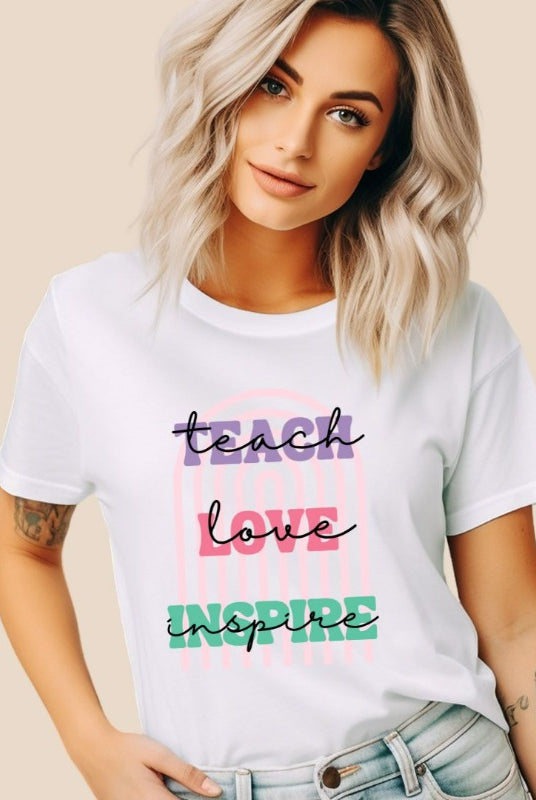 Boho rainbow design featuring the words 'teach love inspire' on a teacher graphic tee, ideal for teacher shirts and teacher gifts. White graphic tees. 