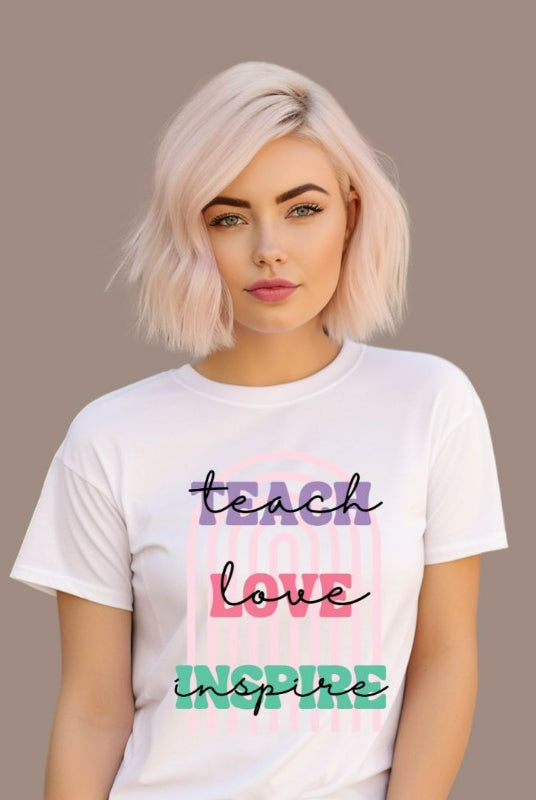 Boho rainbow design featuring the words 'teach love inspire' on a teacher graphic tee, ideal for teacher shirts and teacher gifts. White graphic tees. 