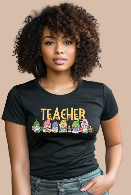 Black teacher graphic tee featuring adorable teacher gnomes and the word 'teacher' - perfect for teacher shirts and teacher gifts. Available in black and white graphic tees.