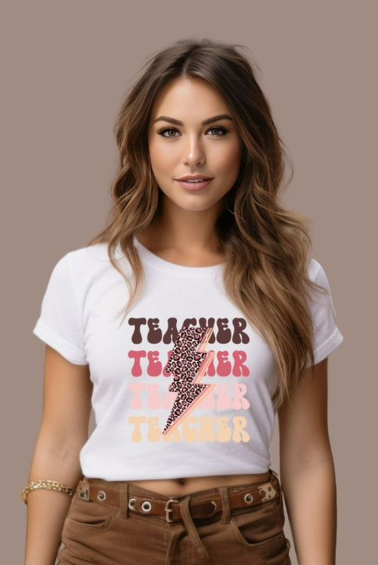"White teacher graphic tee with pink cheetah lightning bolt and the word 'teacher' - perfect for teacher shirts and teacher gifts. Eye-catching graphic tee for educators."