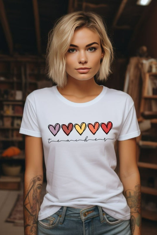 Modern heart design on a white graphic tee with the word 'teacher' - perfect for teacher shirts and teacher gifts. White graphic tees.