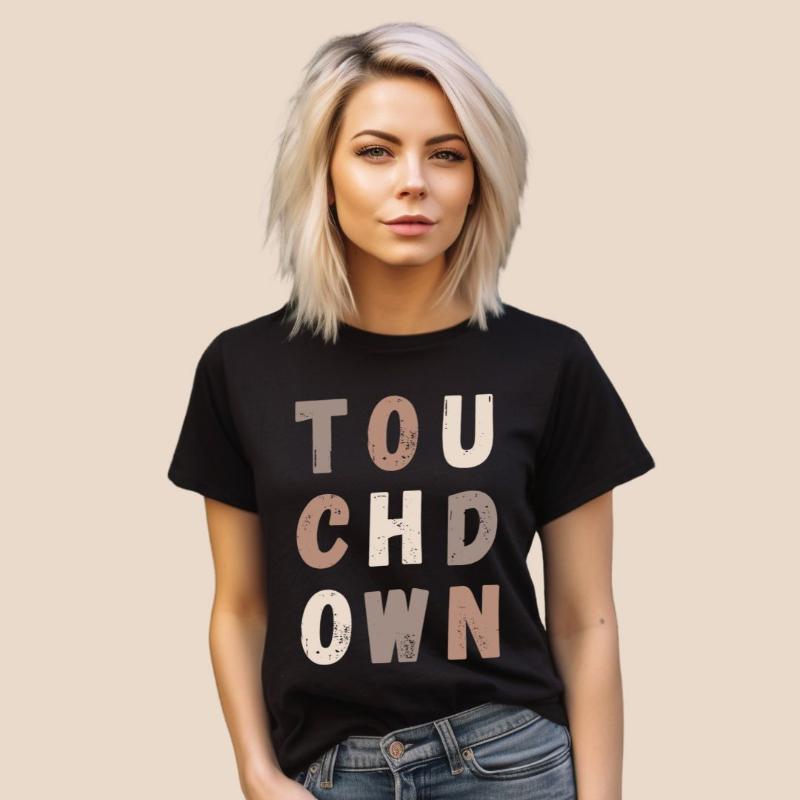 the word "TOUCHDOWN" in a stylish, distressed font with shades of brown, perfect for football fans on a black shirt. 