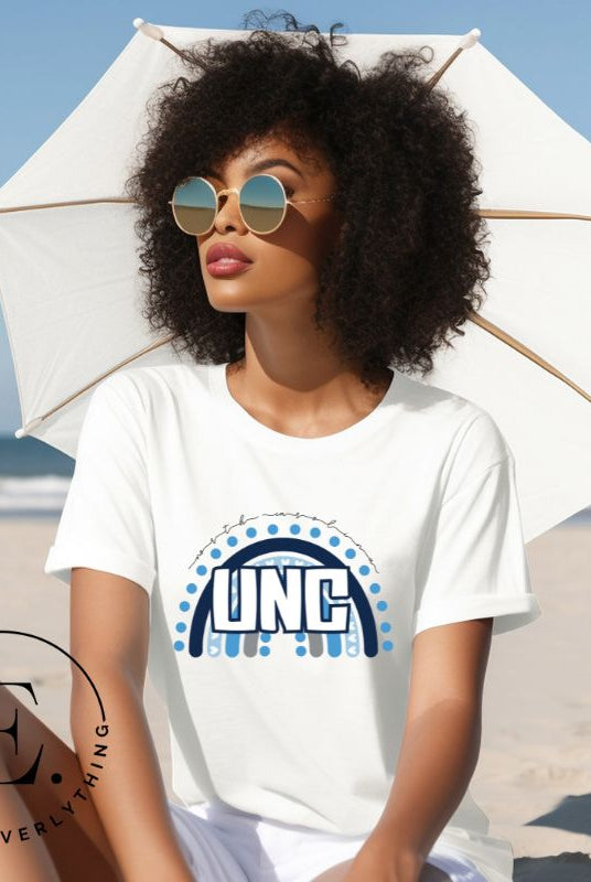 Check out this eye-catching t-shirt designed, featuring the iconic UNC letters set against a vibrant rainbow backdrop. Not only does it let you show off your school spirit, it also sends a trendy and powerful school spirit vibe on a white shirt. 