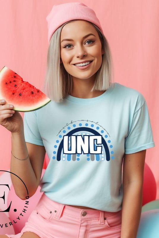 Check out this eye-catching t-shirt designed, featuring the iconic UNC letters set against a vibrant rainbow backdrop. Not only does it let you show off your school spirit, it also sends a trendy and powerful school spirit vibe on a ice blue shirt. 