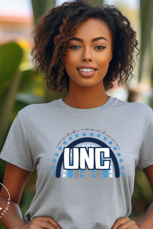 Check out this eye-catching t-shirt designed, featuring the iconic UNC letters set against a vibrant rainbow backdrop. Not only does it let you show off your school spirit, it also sends a trendy and powerful school spirit vibe on a grey shirt. 