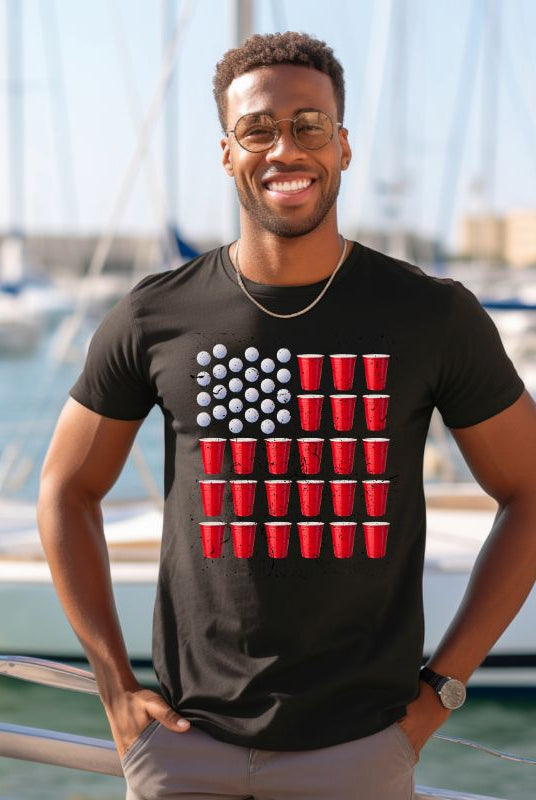 Fun and patriotic USA July 4th graphic tee with beer pong in the form of the USA flag on the front, perfect for festive celebrations and party games on a black graphic tee.