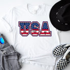 USA American flag lettering PNG sublimation digital download design, on a white graphic tee.