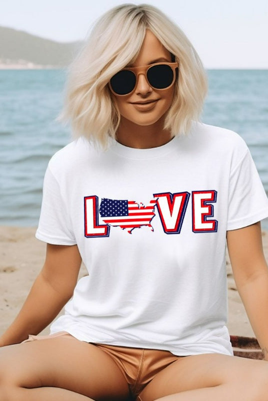 Charming and patriotic USA July 4th graphic tee featuring the word 'Love' with the 'O' represented by the United States map, creating a heartfelt and stylish design on a classic white tee.