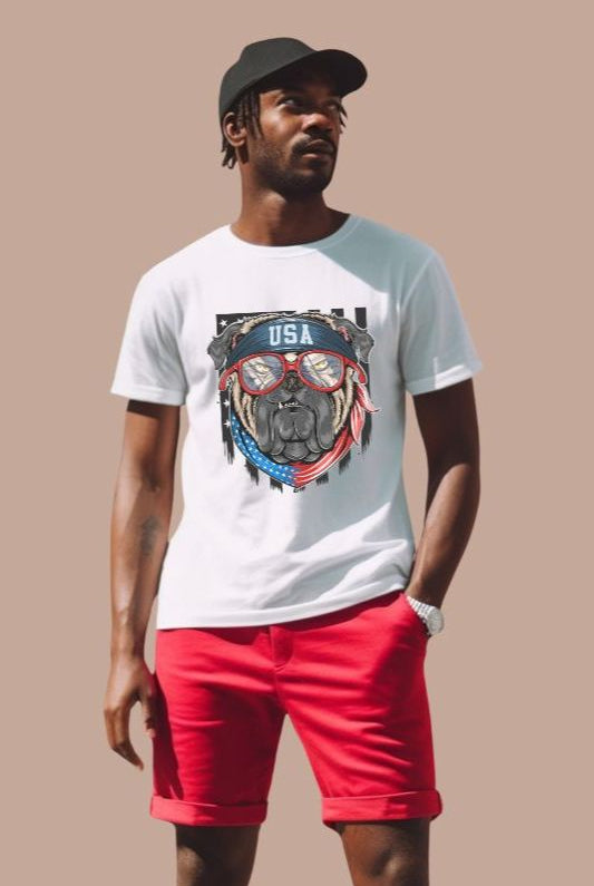 Cute and cool USA July 4th graphic tee featuring a bulldog wearing sunglasses and a USA bandana on the front, perfect for showing off your patriotic and playful side on a white graphic tee.