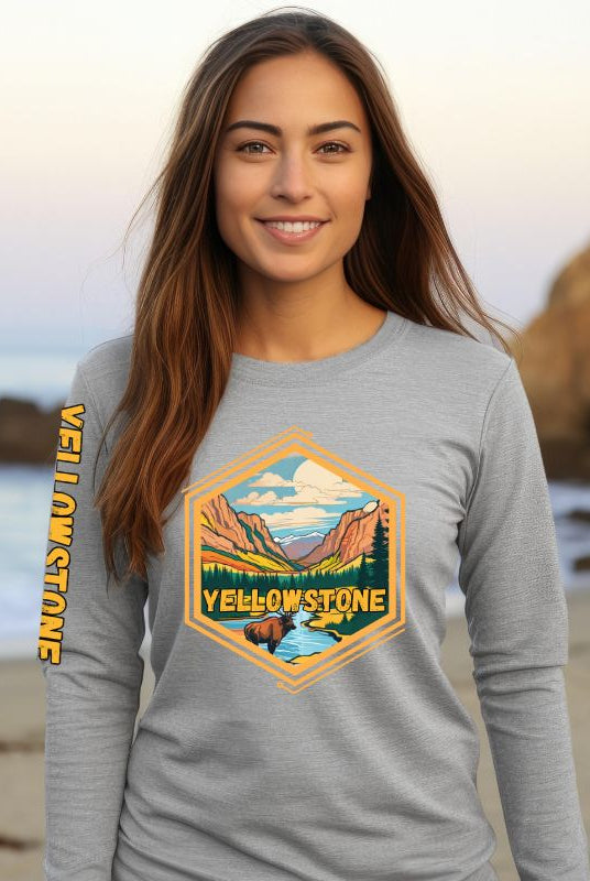 Yellowstone National Park Unisex long-sleeve shirt, with image on right arm and front on a grey shirt.