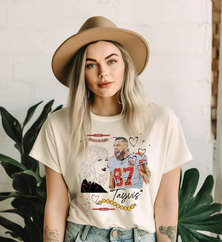 Don't miss out on the latest Pop Culture Phenomenon Taylor Swift + Tavis Kelce Love Story. Friendship bracelets and more on a soft cream t-shirt. 
