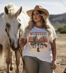 Embrace the rugged charm of the Wild West with our country western shirt featuring the iconic phrase "Western Style" set against a stunning desert background on a white shirt. 