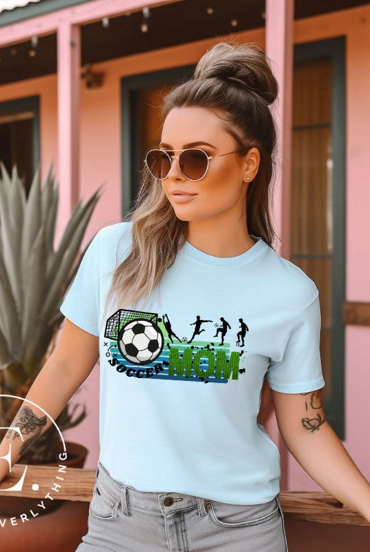 Support your soccer star on and off the field with our Soccer Mom t-shirt. Crafted with soft, breathable fabric, this shirt ensures comfort all day long. It's trendy design showcases your love for the game and your role as a proud soccer mom on a light blue shirt. 