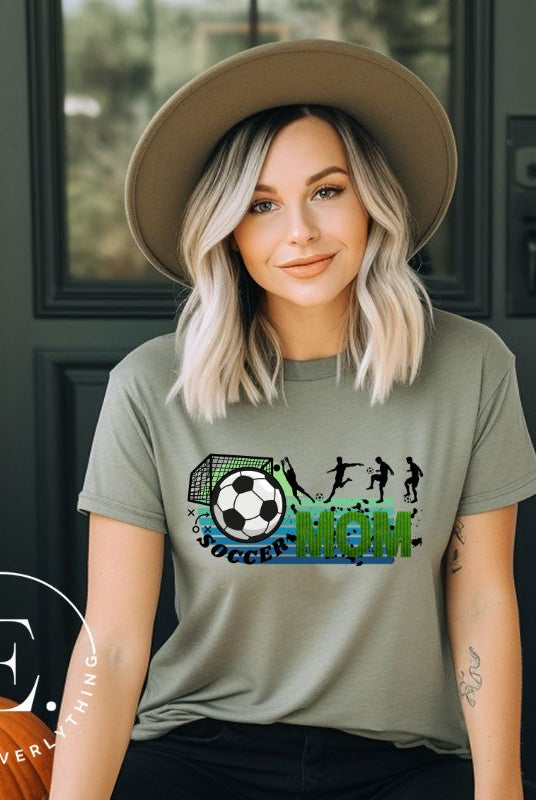 Support your soccer star on and off the field with our Soccer Mom t-shirt. Crafted with soft, breathable fabric, this shirt ensures comfort all day long. It's trendy design showcases your love for the game and your role as a proud soccer mom on a green shirt. 