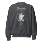 Dark Grey Gildan sweatshirt featuring a vibrant Cancer zodiac design. The front showcases an artistic representation of a woman with flowing hair adorned with a crab, surrounded by celestial elements like moons and stars, in pastel colors. The word "Cancer" is written in a stylish pink script above the design. The sleeve also has "Cancer" written vertically in matching pink script.