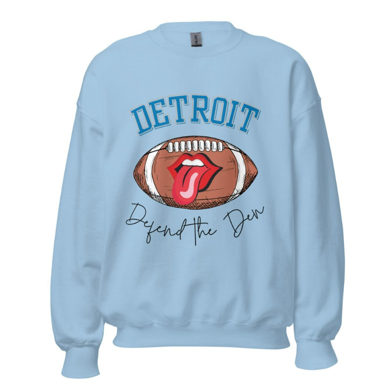 Get ready to show your Detroit Lions pride with this stylish sweatshirt featuring a football and playful lips and tongue design. Complete with the team's slogan "Defend the Den" and the iconic Detroit wordmark, this cozy blue sweatshirt. 