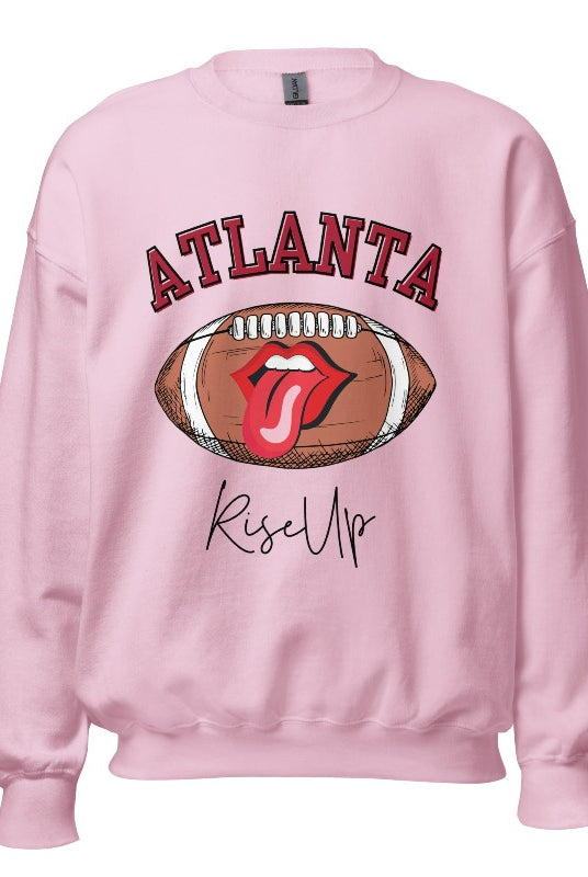 Show your Atlanta Falcons pride with our cozy and warm sweatshirt featuring the team's name and empowering slogan, "Rise Up." On a pink sweatshirt. 