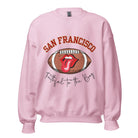 Show you allegiance to the San Francisco 49ers with this trendy sweatshirt, featuring a football and playful lips and tongue design. Emblazoned with the team's slogan "Faithful to the Bay" and the iconic San Francisco wordmark, on a light pink sweatshirt. 