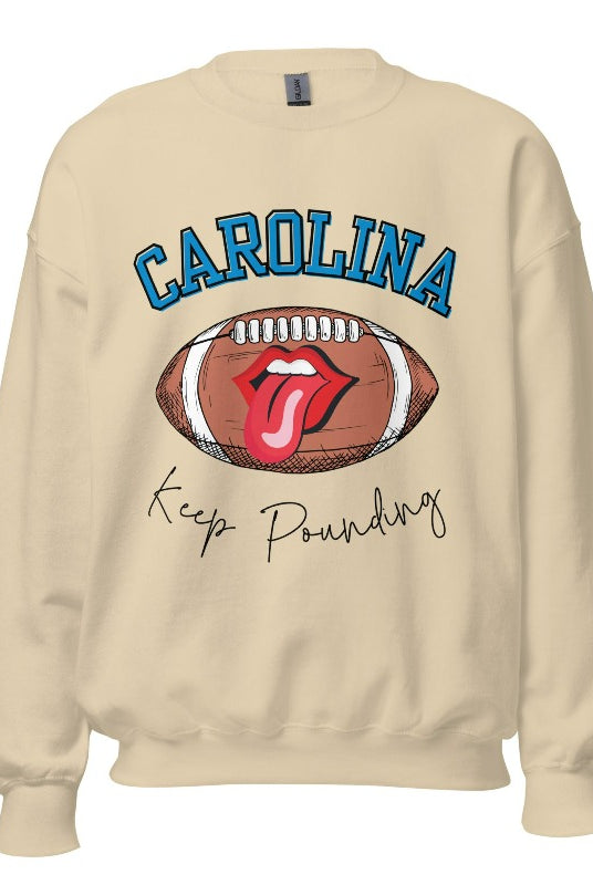 Support the Carolina Panthers in style with our modern and trendy sweatshirt featuring the team's name and powerful teams slogan, "Keep Pounding." On a sand colored sweatshirt. 