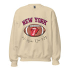 Elevate your game-day attire with this New York Giants sweatshirt, featuring a football and unique lips and tongue design. Highlighted with the team's empowering slogan "We Win Our Way" and the iconic New Yor wordmark, on a sand colored sweatshirt. 