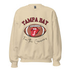 Get ready to showcase your support for the Tampa Bay Buccaneers with this eye-catching sweatshirt. Featuring a football and playful lips and tongue design, it proudly displays the team's rallying cry "Fire the Cannons" and the distinctive Tampa Bay wordmark on a sand colored sweatshirt. 
