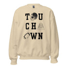 "TOUCHDOWN" letters, featuring a football helmet, field, and football graphics on a beige sweatshirt. 