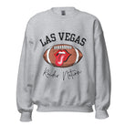 Get ready to support the Las Vegas Raiders in style with our premium sweatshirt, featuring the team's name and iconic slogan, "Raider Nation." On a grey sweatshirt. 