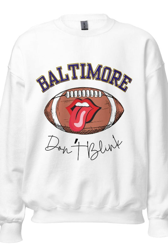 Embrace your Baltimore Ravens pride with our modern and trendy sweatshirt featuring the team's name and powerful slogan, "Don't Blink." On a white sweatshirt. 