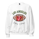Cheer on the Los Angeles Rams in style with our exclusive sweatshirt featuring the team name and iconic slogan, "Ram House." On a white sweatshirt. 