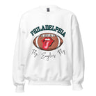 Show your support for the Philadelphia Eagles with this stylish sweatshirt, featuring a football and fun lips and tongue design. Complete with the team's iconic slogan "Fly Eagles Fly" and the distinctive Philadelphia wordmark, on a white sweatshirt. 
