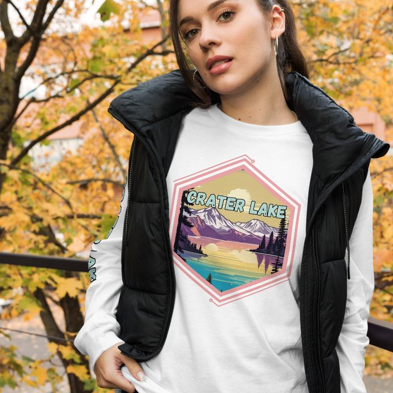 A colorful illustration of Crater Lake National Park with the text 'Crater Lake National Park' and 'Oregon 1902'. The right sleeve also has the text 'Crater Lake' on a white shirt.