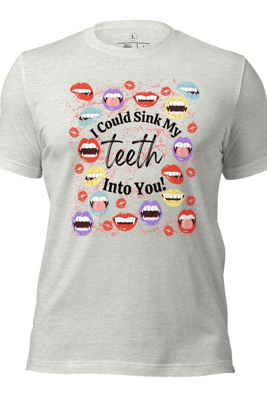 Sink your teeth into Halloween style with our vampire lips shirt. Adorned with a collection of seductive vampire lips, this shirt mesmerizes with its allure. The cheeky message, 'I could sink my teeth into you,' adds a playful twist on an athletic heather grey shirt. 