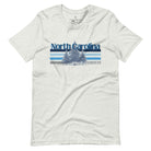 Show your school pride with this iconic North Carolina wordmark t-shirt. Made from premium materials, it features a North Carolina tree line in a the cool Carolina blue colors, representing a tradition of excellence for the nature that North Carolina offers on an ash shirt. 