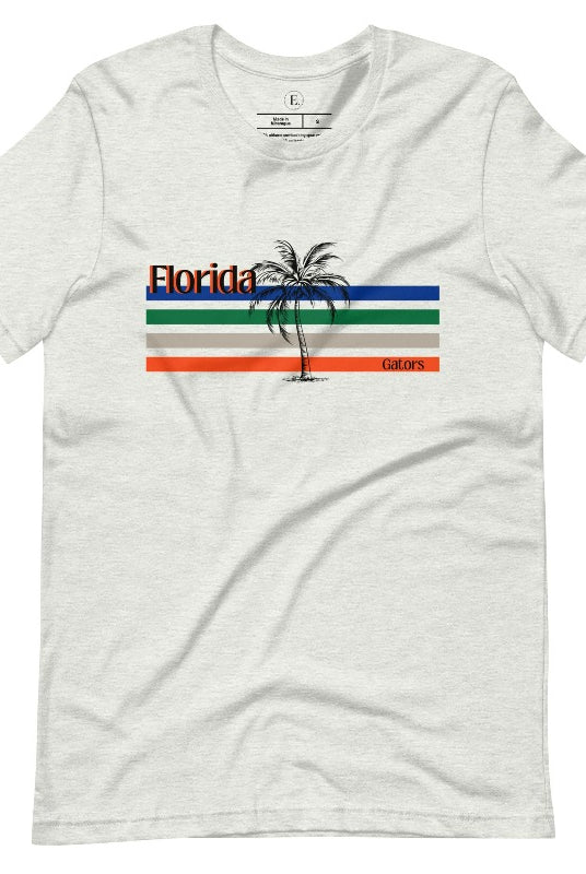 Celebrate your love for the Florida Gators with our modern-inspired retro t-shirt. It captures the essence of campus life, featuring school colors in lines and a palm tree motif on an ash colored shirt. 