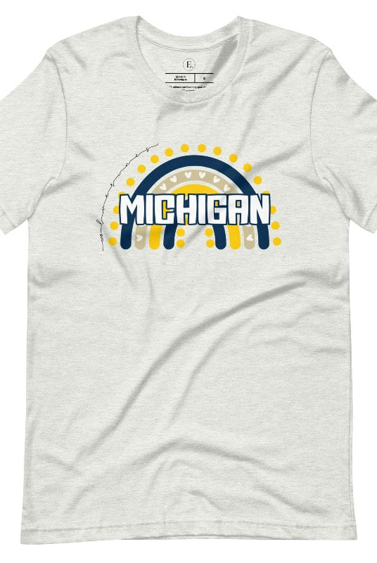 Unleash your vibrant spirit with our Michigan graphic tee. Adorned with a rainbow in school colors and "Michigan" in playful block bubble lettering, this shirt exudes energy and Wolverine pride on an ash colored shirt. 