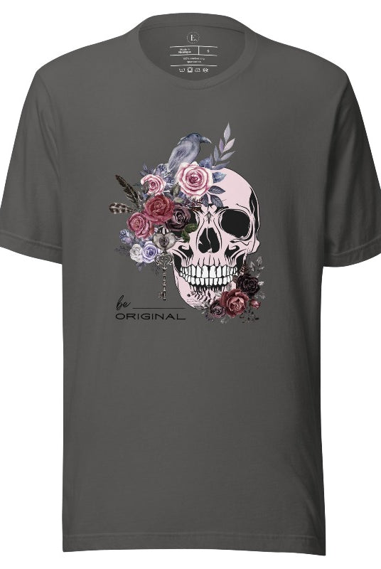 Looking for a unique Halloween shirt? Look no further! Our hauntingly beautiful shirt features a floral skull, raven, and the empowering slogan 'Be Original'. Stand out from the crowd with this unforgettable statement piece on an asphalt colored shirt. 