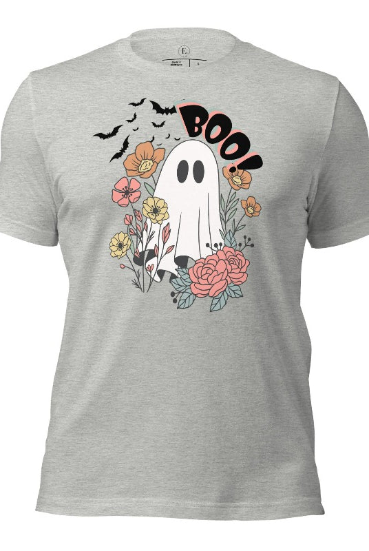 Get ready for Halloween with our cute and spooky ghost-themed shirt! Featuring a whimsical design with a cute ghost, flowers, and bats in a starry sky, it's the perfect blend of spooky and sweet on an athletic heather grey shirt. 